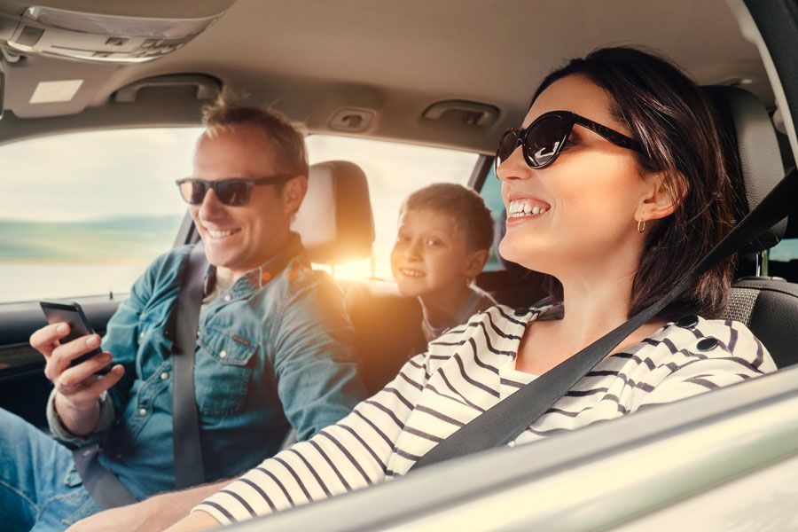 family in car